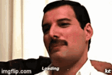Freddie Loading Freddie Mercury GIF - Freddie Loading Freddie Mercury 80s Freddie GIFs