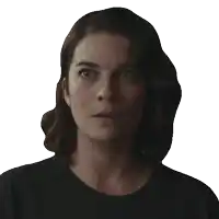 a woman in a black shirt has the word yes on her face