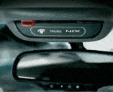 a rear view mirror with a trunk nix button