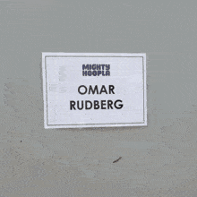 a door with a sign that says omar rudberg