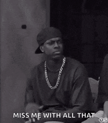 a black and white photo of a man with the words miss me with all that