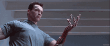 Terminator 2 GIF - Terminator Cyborg Robot Hands GIFs