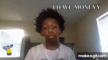a young boy with a cheerleader behind him says " i have moneyy "