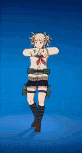 a girl in a school uniform is dancing with her hands in the air .