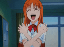 a girl with orange hair and a red bow tie is laughing with her arms crossed