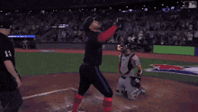 a baseball player with the number 13 on his back