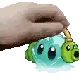 a person is holding a slipper over a cartoon character .