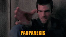 a yellow can with the word paupanekis in yellow letters