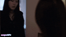 a close up of a woman 's face with the words vespagifs visible