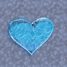 a broken heart with an arrow through it and ice coming out of it