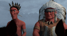 two native americans are standing next to each other and one has a feathered headdress on