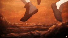 a close up of a person 's feet in a video