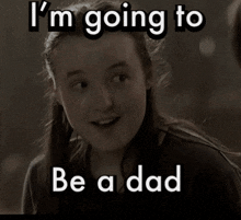 a girl with the words i 'm going to be a dad next to her
