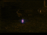 a purple object is surrounded by a glowing circle of water