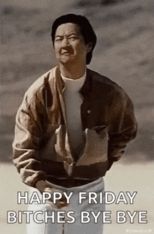 a man in a brown jacket is standing in the desert .
