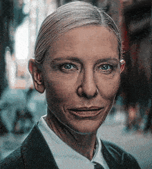 a close up of a woman 's face with wrinkles
