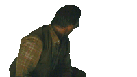 a man in a plaid shirt and vest says holy sh