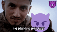 a man with a devil face and the words feeling devious behind him