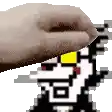 a close up of a person 's hand touching a pixelated image of a person .