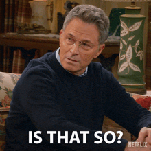 a man sitting on a couch with the words is that so written on the bottom