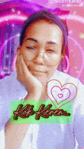 a woman wearing glasses and a headband with the words kop keren