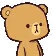 a brown teddy bear kissing a white teddy bear on the cheek .