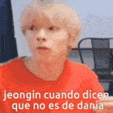 a blurry picture of a person with the words jeongin cuando dicen que no es de dania below them