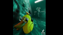 a yellow duck wearing glasses is swimming in a dark room .