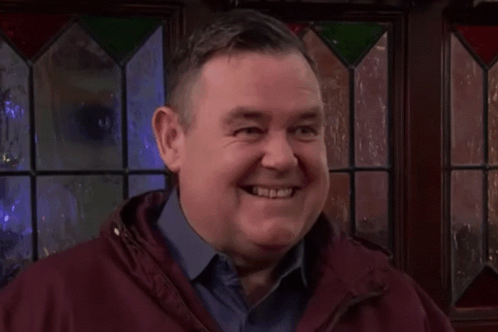 George Smiling And Looking Down Coronation Street 