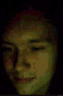 a screenshot of a person 's face with kykyna kuchina written on it