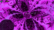 a computer screen shows a purple and black background with a circle in the middle .