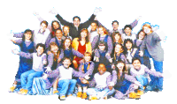 a group of children are posing for a picture with their arms in the air