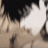 a close up of a person 's face with a blurry background