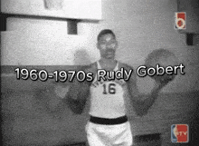 a black and white photo of a basketball player with the name rudy gobert