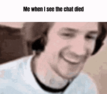 a blurry picture of a man 's face with the words `` me when i see the chat died '' written on it .
