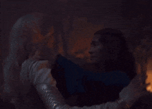 a blurry picture of a person holding a torch