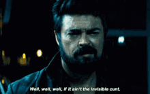 a man with a beard says " well well well if it ain 't the invisible cunt "