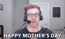 a man wearing headphones and a microphone says happy mother 's day on a video call .