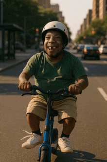 a man wearing a helmet is riding a blue scooter on a street
