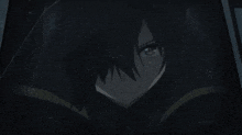 a silhouette of a person in a dark room