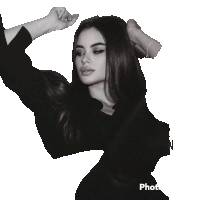a black and white photo of a woman with the word photo under her