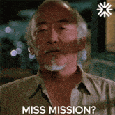 a close up of a man 's face with the words miss mission behind him
