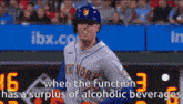 a man in a new york mets baseball uniform is running towards home plate