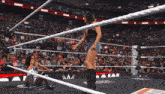 a woman in a wrestling ring with the word ram written on the ropes