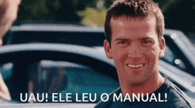 a man is smiling with the words uau ele leu o manual written below him