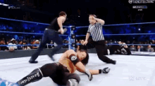 a wrestling match is being shown live on the sdlive channel