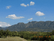 a photo of a mountain range taken on the 7th of may 2025