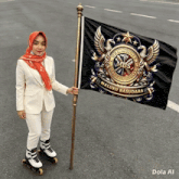 a woman wearing roller skates holds a flag that says mbs