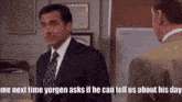 a man in a suit and tie is standing next to another man in an office .