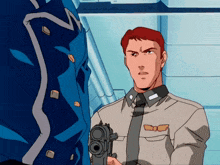 a man in a military uniform holds a gun